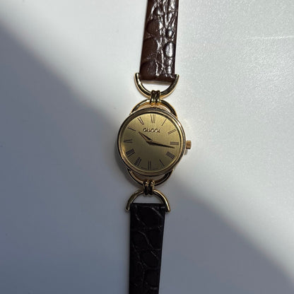Gucci 1990s Gold Round Dial Horsebit Gold Plated Watch
