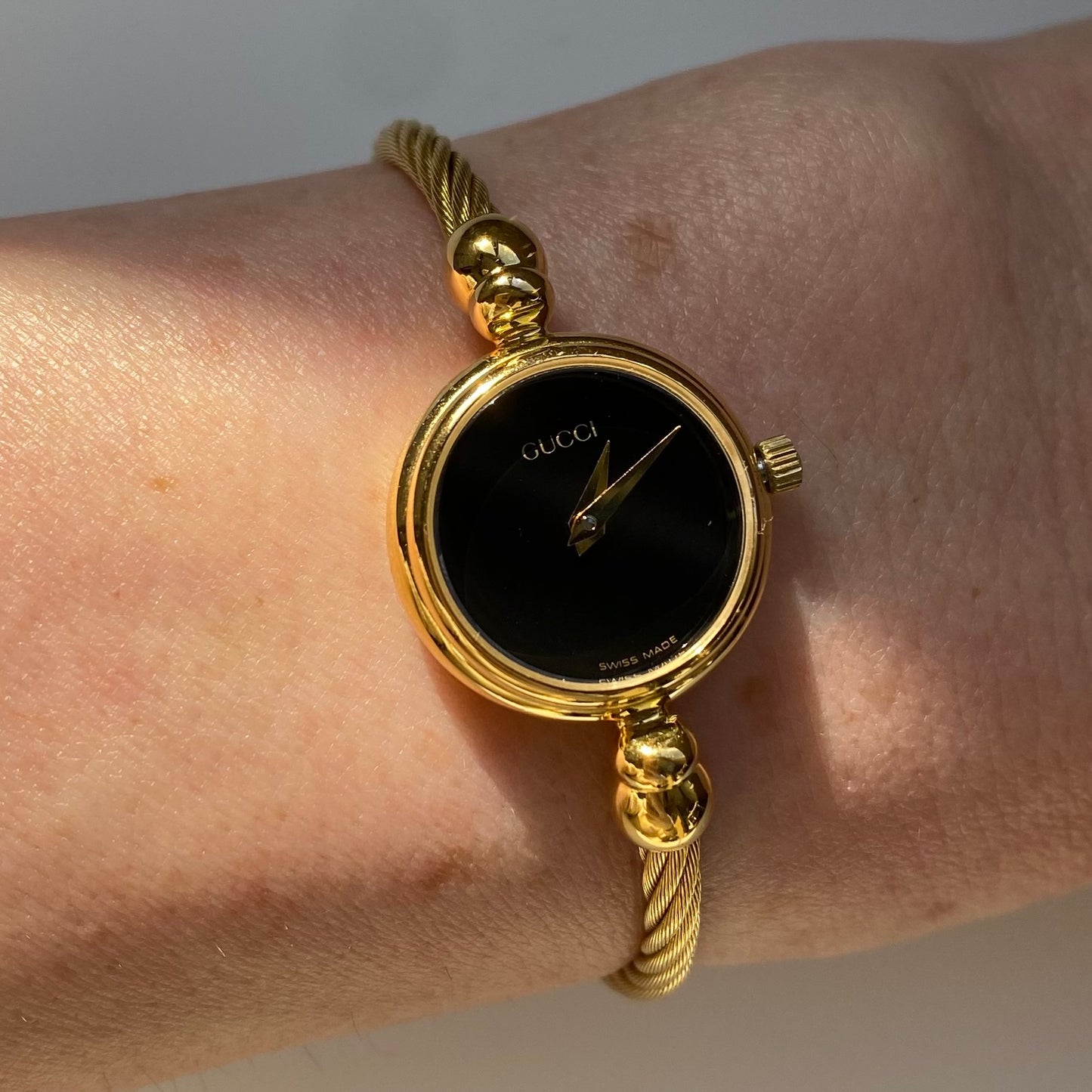 Gucci 1990s Black Dial Gold Plated Cable Bangle Watch