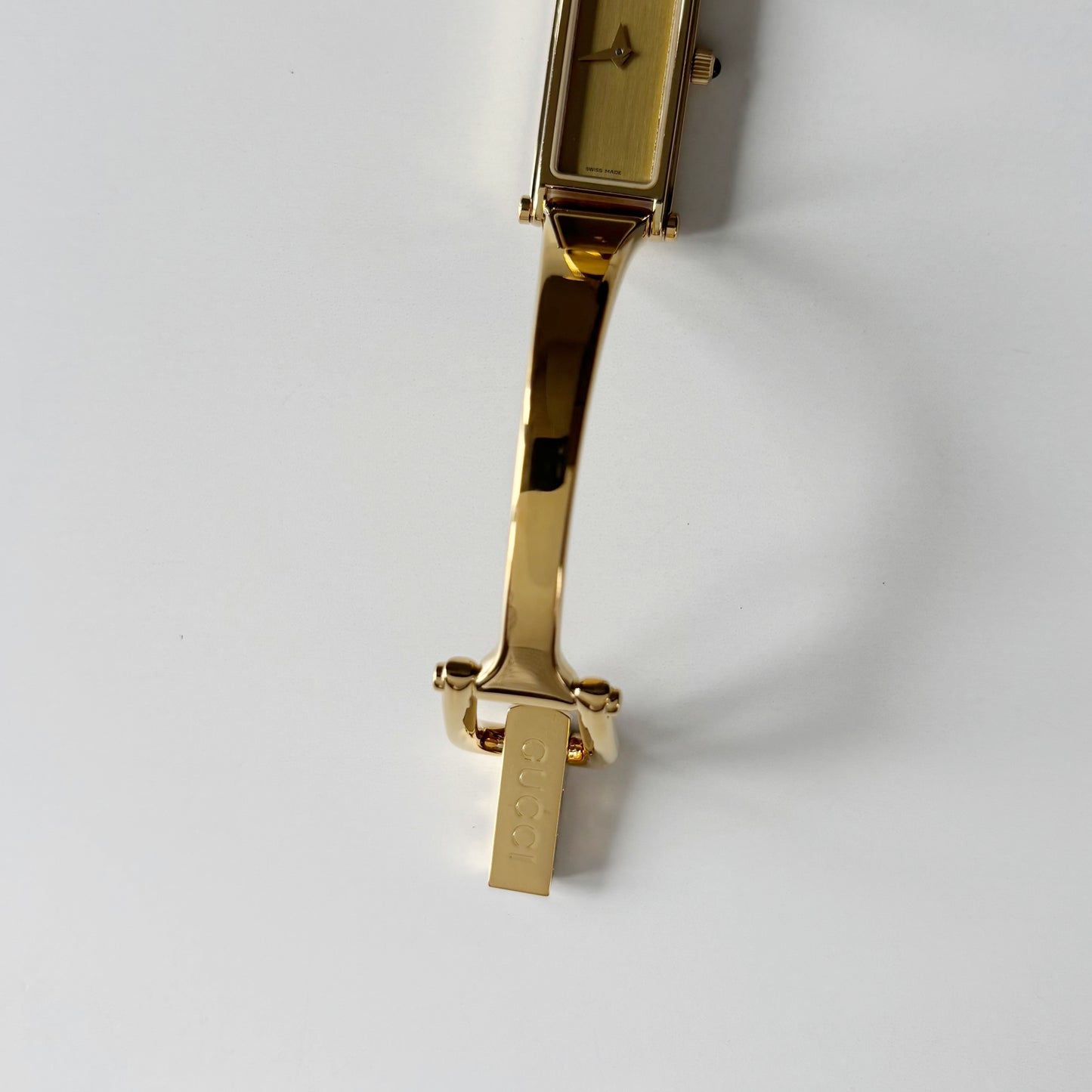 Gucci 1990s Gold Rectangular Dial Gold Plated Bangle Watch