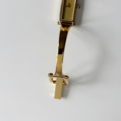 Gucci 1990s Gold Rectangular Dial Gold Plated Bangle Watch