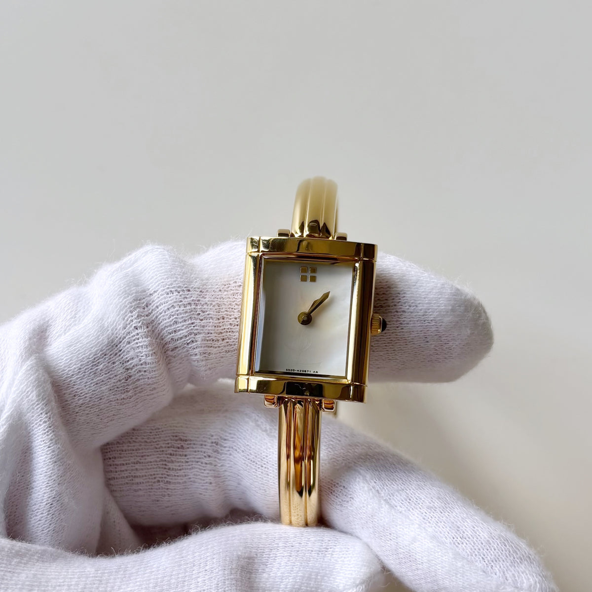 Yves Saint Laurent 1990s Seashell Dial Gold Plated Bangle Watch