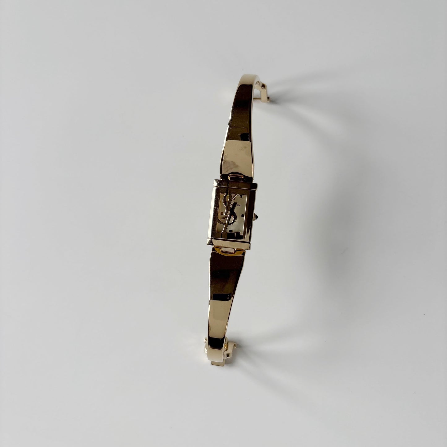 Yves Saint Laurent 1990s Peek-A-Boo Gold Plated Bangle Watch