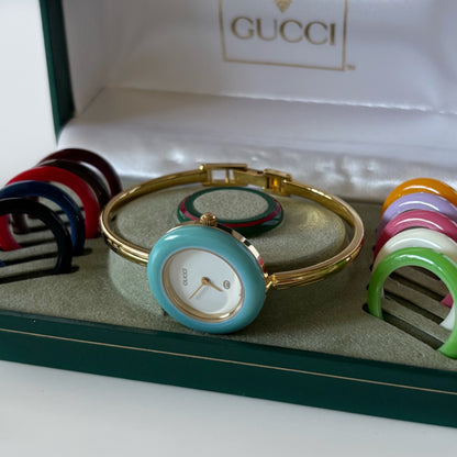 Gucci 1990s Interchangeable Bezel Gold Plated Bangle Watch with 12 bezels, case