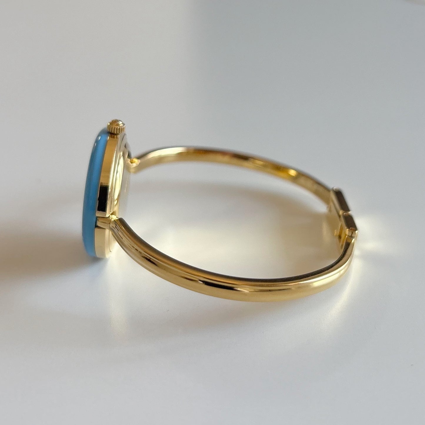 Gucci 1990s Interchangeable Bezel Gold Plated Bangle Watch with 12 bezels, case