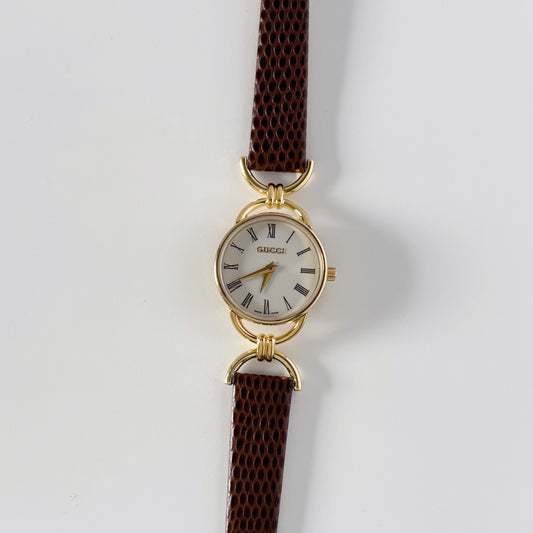 Gucci 1990s Round Dial Horsebit Gold Plated Watch
