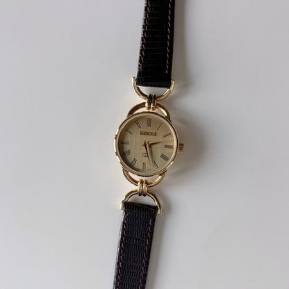 Gucci 1980s Round Dial Horsebit Gold Plated Watch