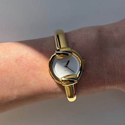 Gucci 1990s Round Dial Gold Plated Bangle Watch (Small)