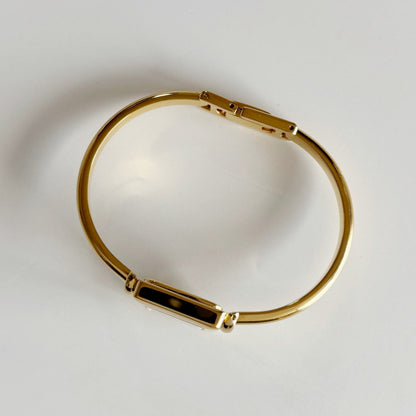 Gucci 1990s Square Dial Gold Plated Bangle Watch