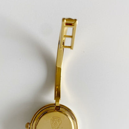 Gucci 1990s Interchangeable Bezel Gold Plated Bangle Watch with 12 bezels, case