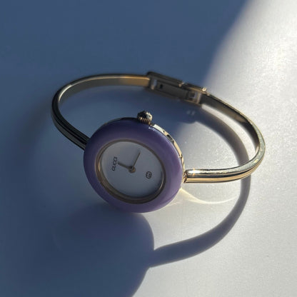 Gucci 1990s Interchangeable Bezel Gold Plated Bangle Watch with 12 bezels, case