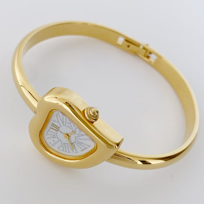 Yves Saint Laurent 1990s Heart Shaped Gold Plated Bangle Watch