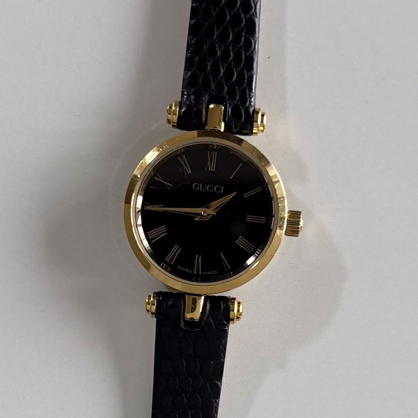 Gucci 1990s Black Round Dial Gold Plated Watch
