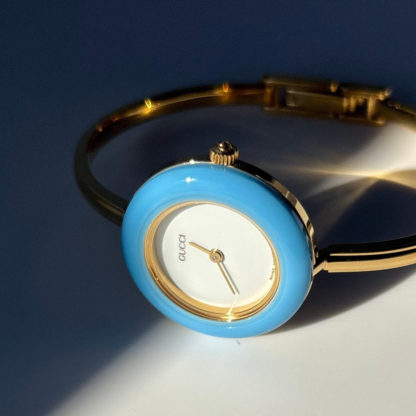 Gucci 1990s Interchangeable Bezel Gold Plated Bangle Watch with 12 bezels, case