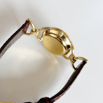 Gucci 1990s Round Dial Gold Plated Horsebit Watch