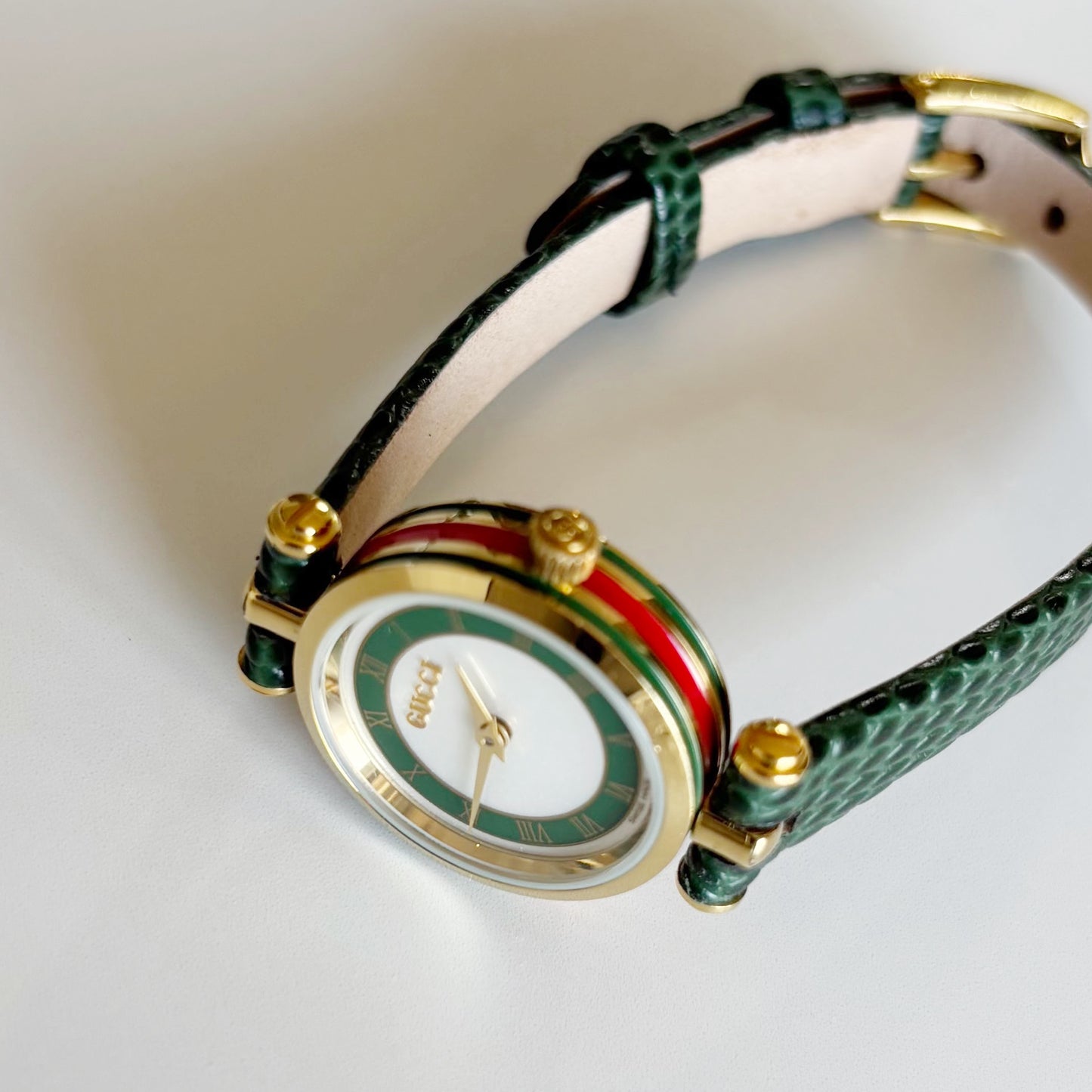 Gucci 1990s Round Dial Green Gold Plated Watch