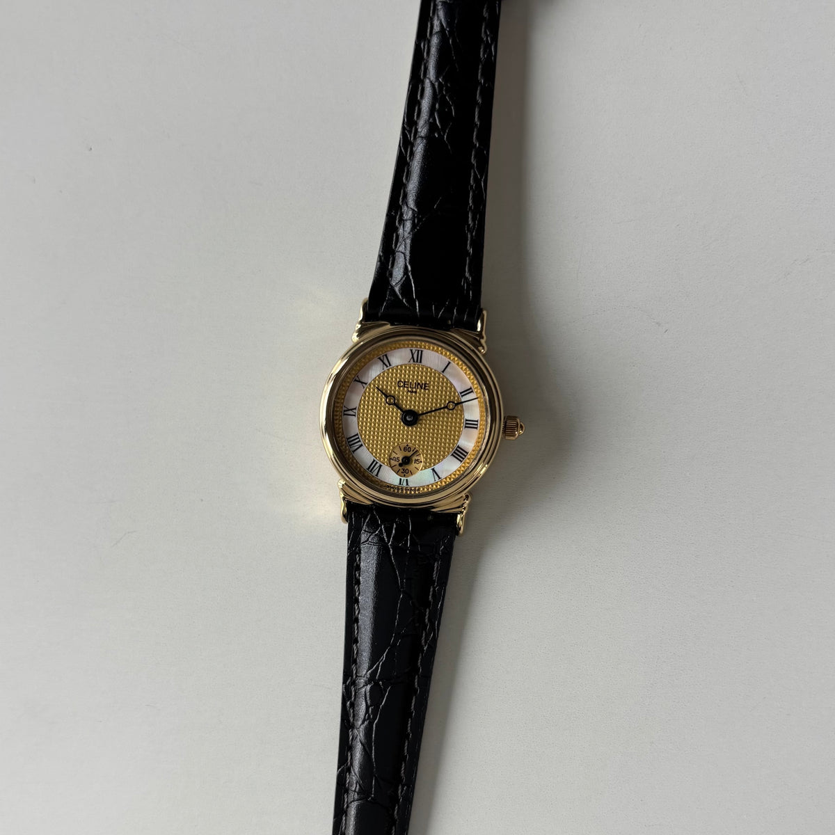 Celine 1980s Seashell Round Dial Gold Plated Watch