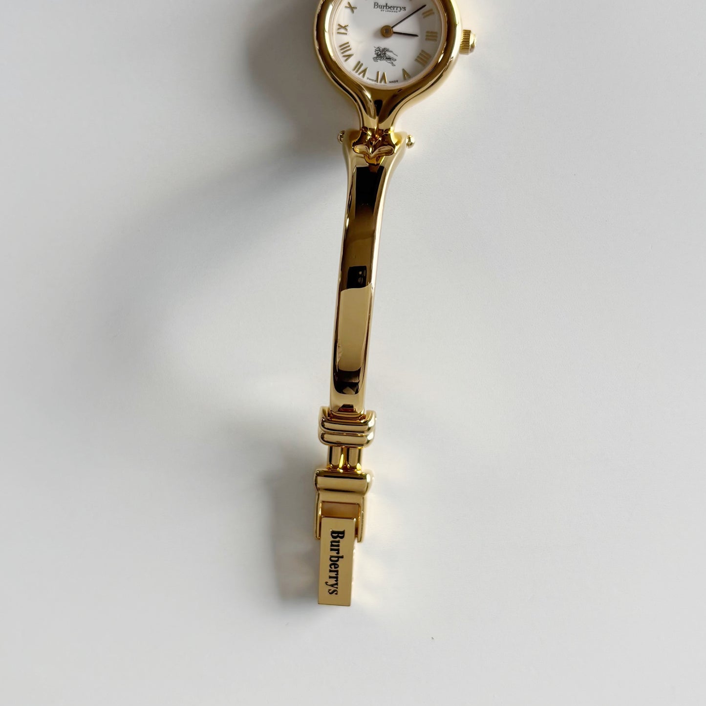 Burberry 1990s Round Dial Gold Plated Bangle Watch