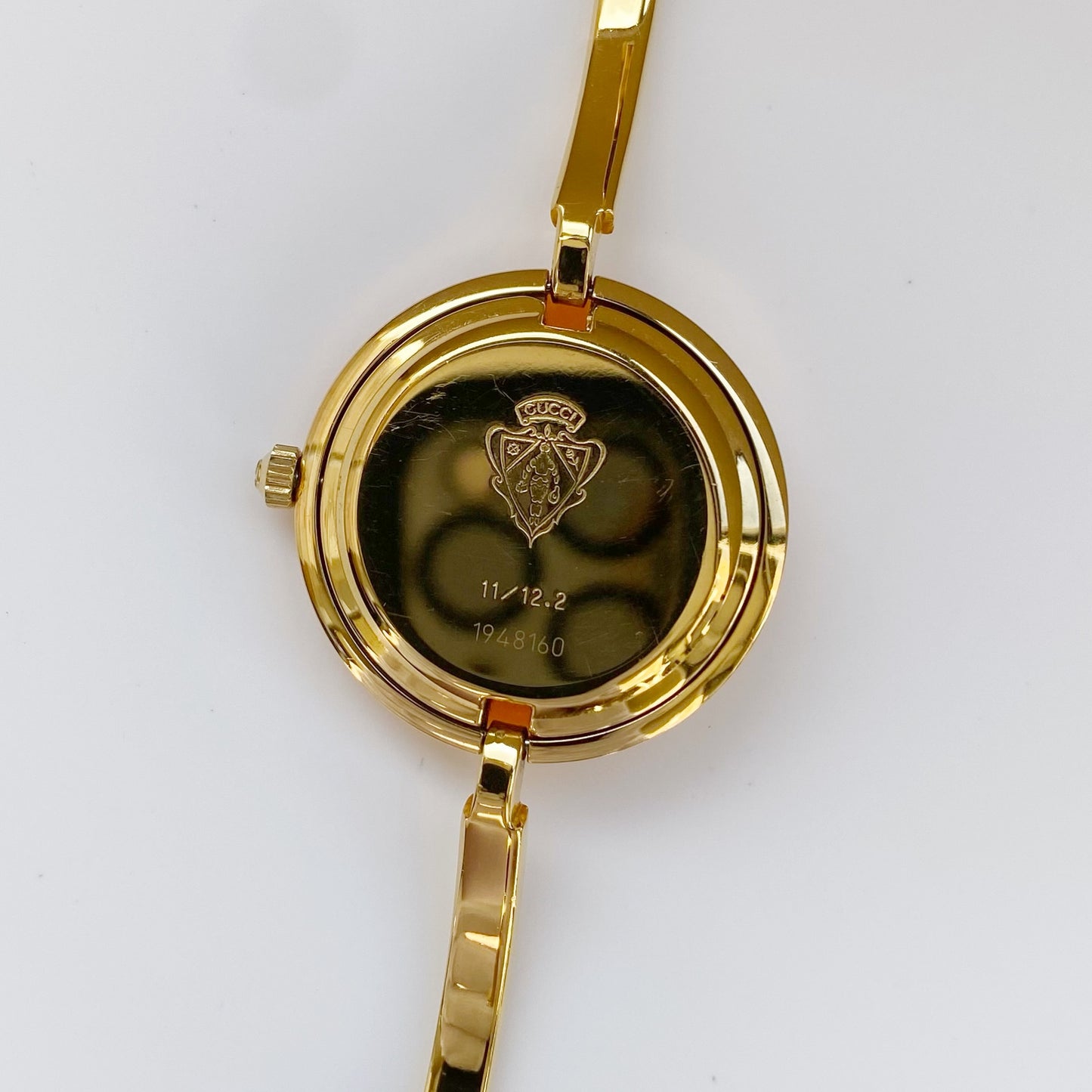 Gucci 1990s Interchangeable Bezel Gold Plated Bangle Watch with 12 bezels, case