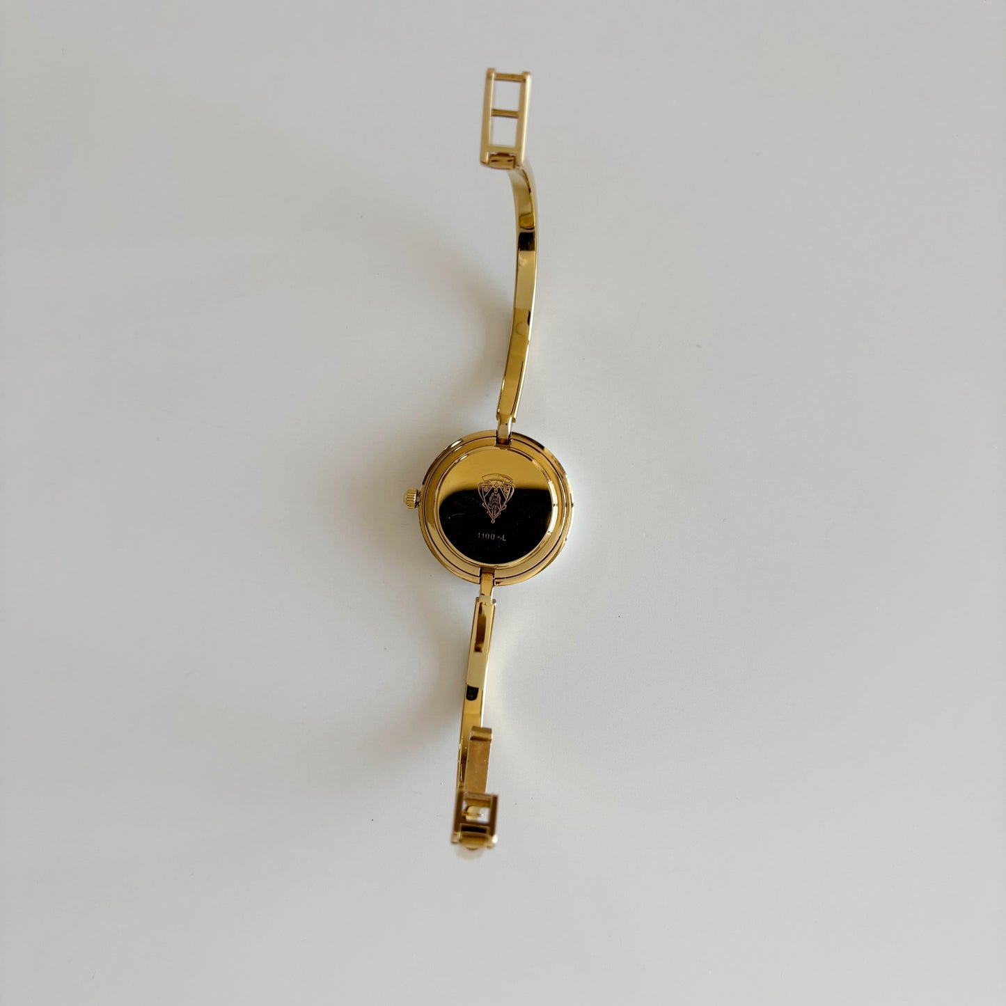 Gucci 1980s Interchangeable Bezel Gold Plated Bangle Watch with 12 bezels, case