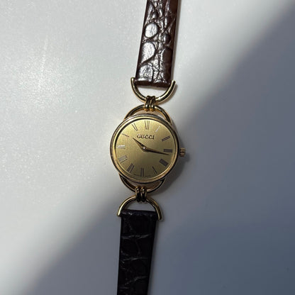 Gucci 1990s Gold Round Dial Horsebit Gold Plated Watch
