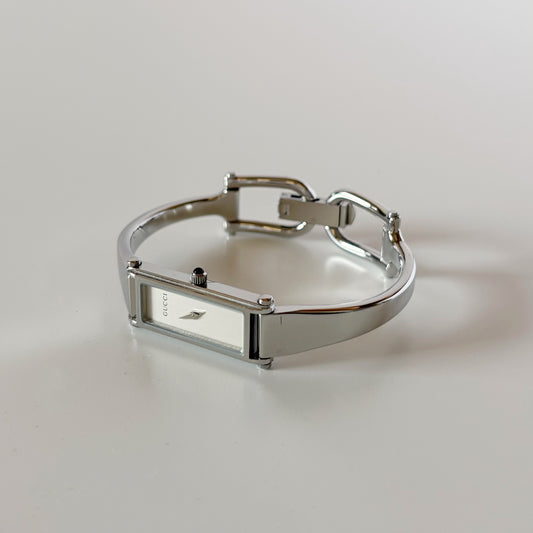 Gucci 1990s Rectangular Dial Silver Bangle Watch