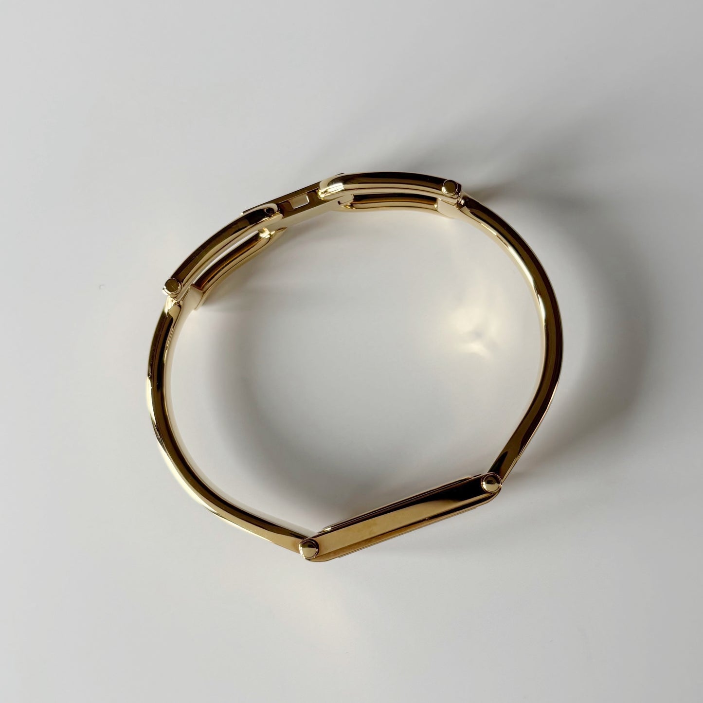 Gucci 1990s Gold Rectangular Dial Gold Plated Bangle Watch