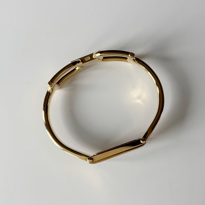 Gucci 1990s Gold Rectangular Dial Gold Plated Bangle Watch