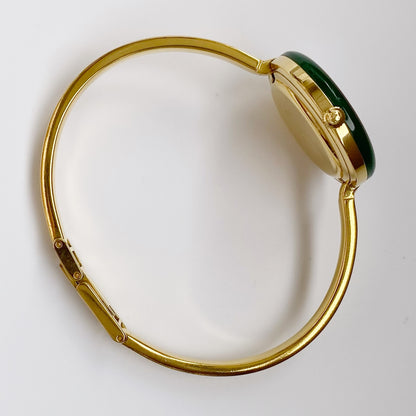 Gucci 1990s Interchangeable Bezel Gold Plated Bangle Watch with 12 bezels, case