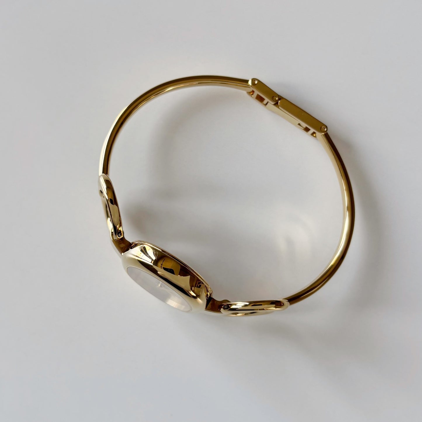 Gucci 1990s Oval Dial Gold Plated Bangle Watch