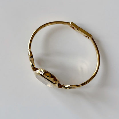 Gucci 1990s Oval Dial Gold Plated Bangle Watch