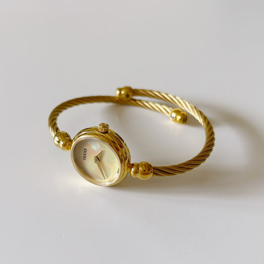 Gucci 1990s Seashell Dial Gold Plated Bangle Watch