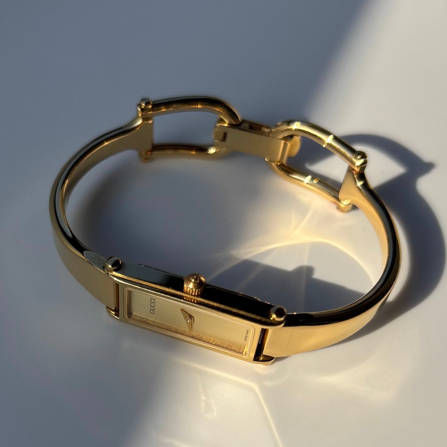 Gucci 1990s Gold Dial Rectangular Gold Plated Bangle Watch
