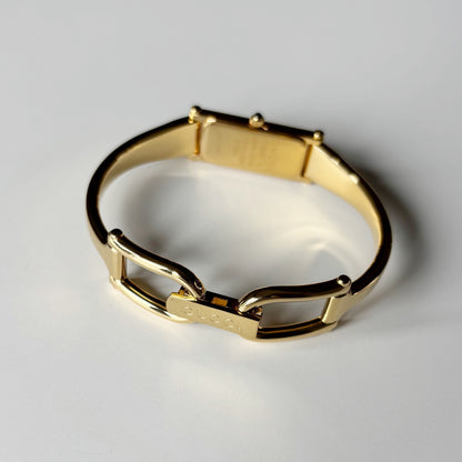 Gucci 1990s Seashell Rectangular Dial Gold Plated Bangle Watch