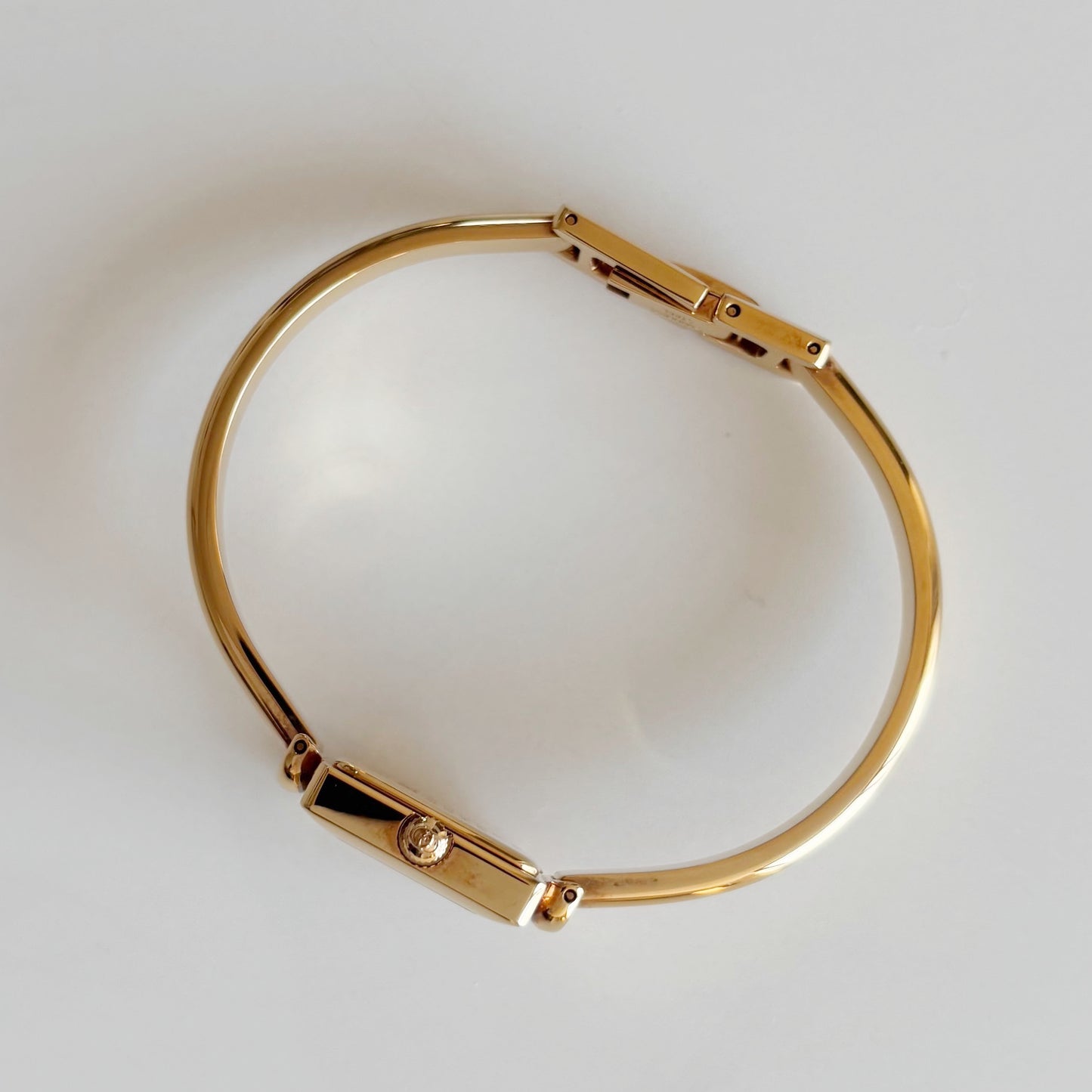 Gucci 1990s Seashell Square Dial Gold Plated Bangle Watch