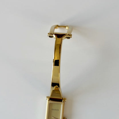 Gucci 1990s Rectangular Gold Dial Gold-Plated Watch