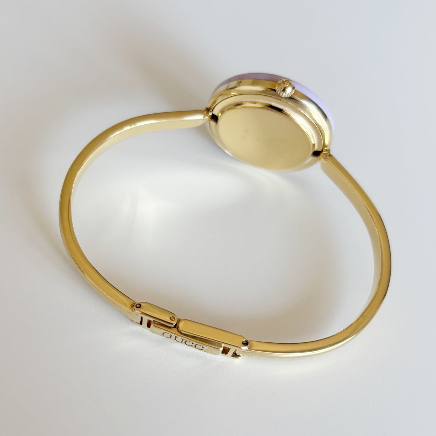 Gucci 1990s Interchangeable Bezel Gold Plated Bangle Watch with 12 bezels, case