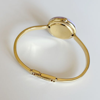 Gucci 1990s Interchangeable Bezel Gold Plated Bangle Watch with 12 bezels, case