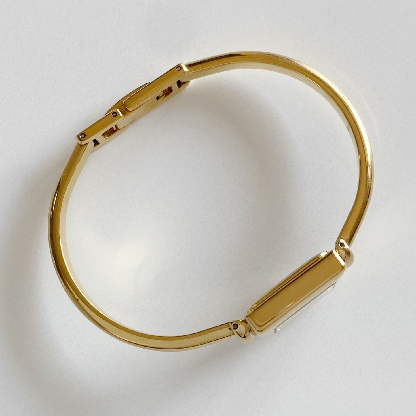 Gucci 1990s Square Dial Gold Plated Bangle Watch