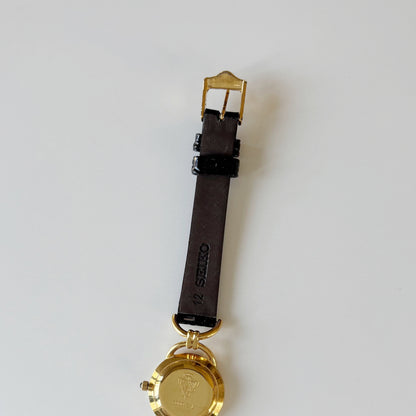 Gucci 1990s Black Round Dial Horsebit Gold Plated Watch