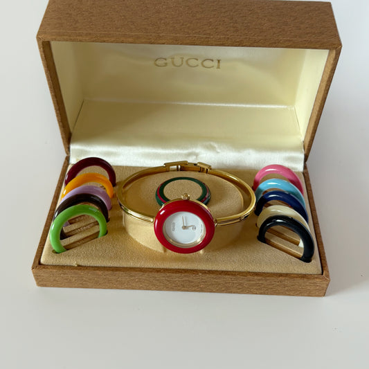 Gucci 1990s Interchangeable Bezel Gold Plated Bangle Watch with 12 bezels, case