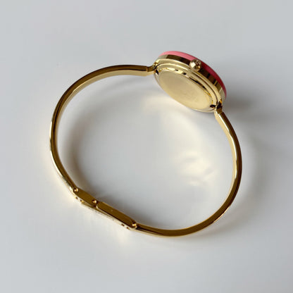 Gucci 1990s Interchangeable Bezel Gold Plated Bangle Watch with case, 12 bezels