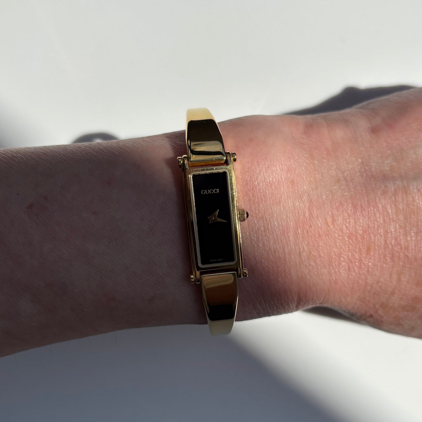 Gucci 1990s Black Dial Gold Plated Bangle Watch