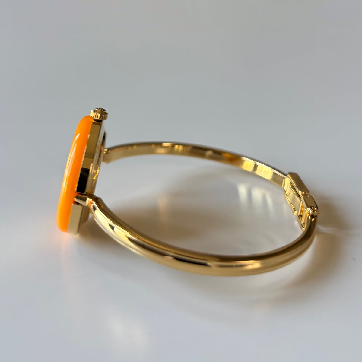 Gucci 1990s Interchangeable Bezel Gold Plated Bangle Watch with 12 bezels, case