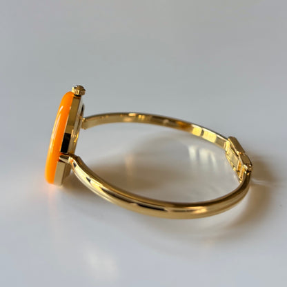 Gucci 1990s Interchangeable Bezel Gold Plated Bangle Watch with 12 bezels, case