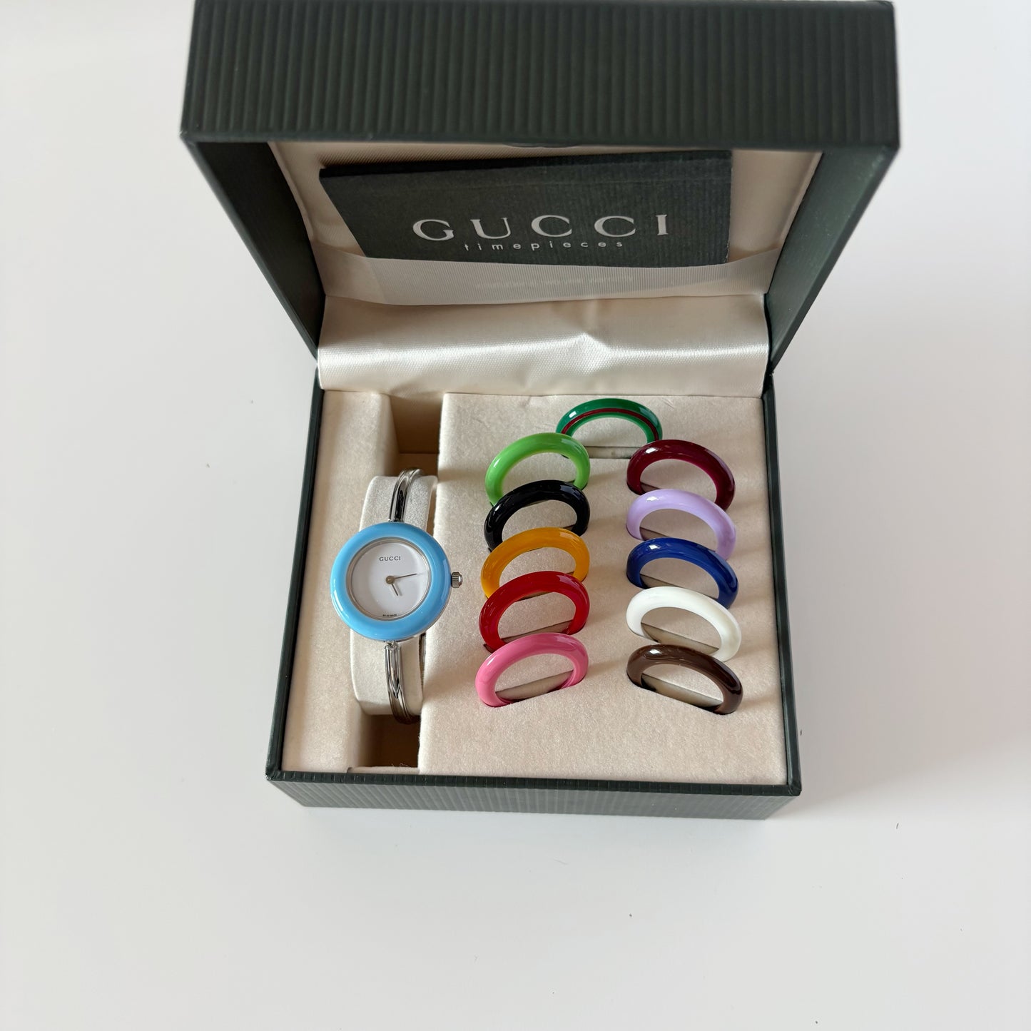 Gucci 1990s Interchangeable Bezel Silver Stainless steel Bangle Watch with 12 bezels, case