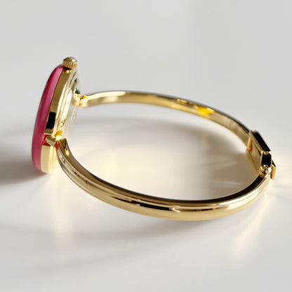 Gucci 1990s Interchangeable Bezel Gold Plated Bangle Watch with 12 bezels, case