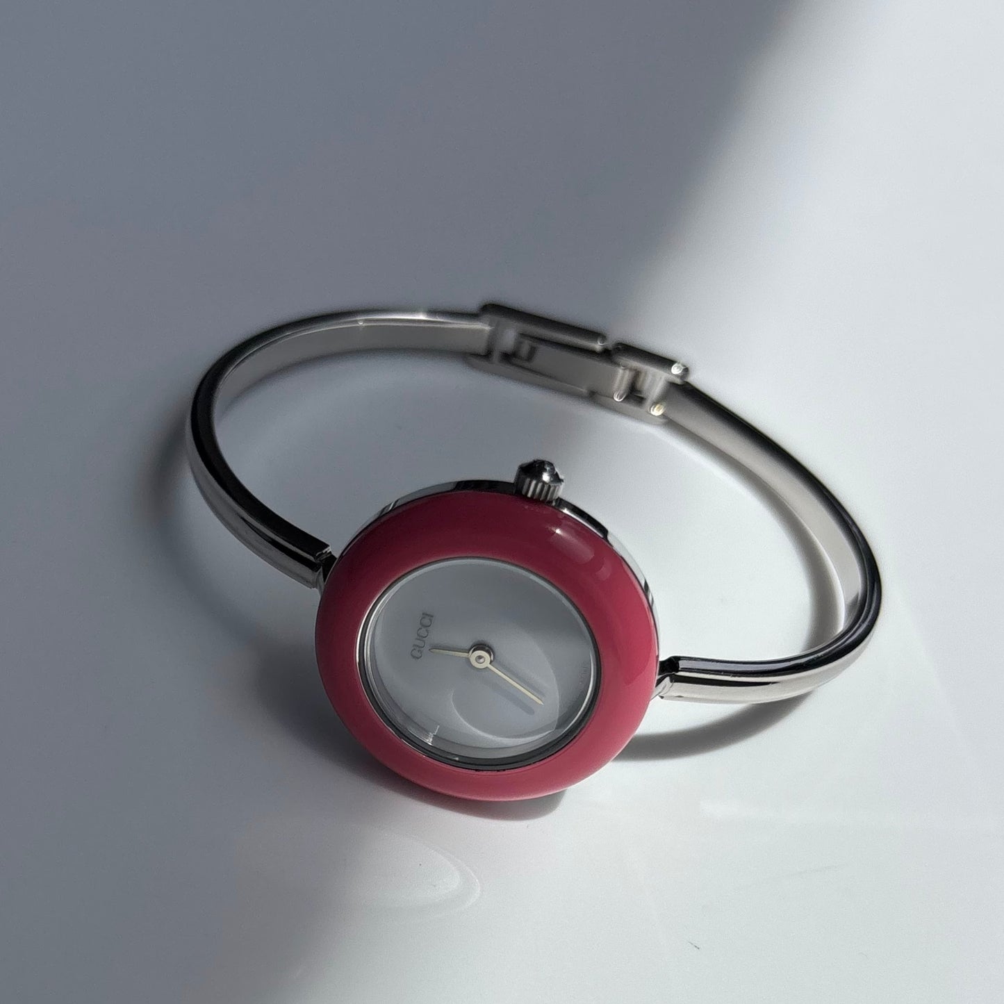 Gucci 1990s Interchangeable Bezel Stainless steel Bangle Watch with case, 12 bezels