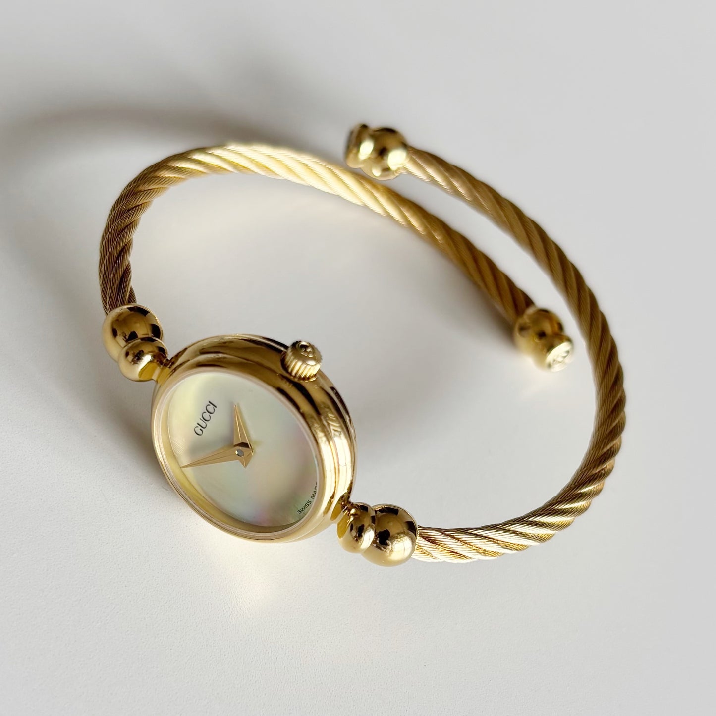 Gucci 1990s Seashell Dial Gold Plated Cable Bangle Watch
