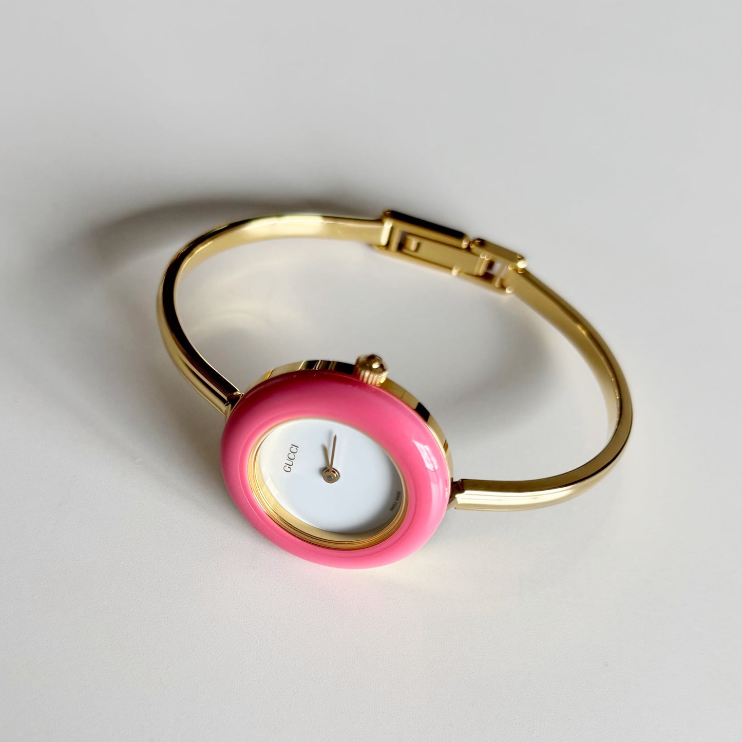 Gucci 1990s Interchangeable Bezel Gold Plated Bangle Watch with 12 bezels, case