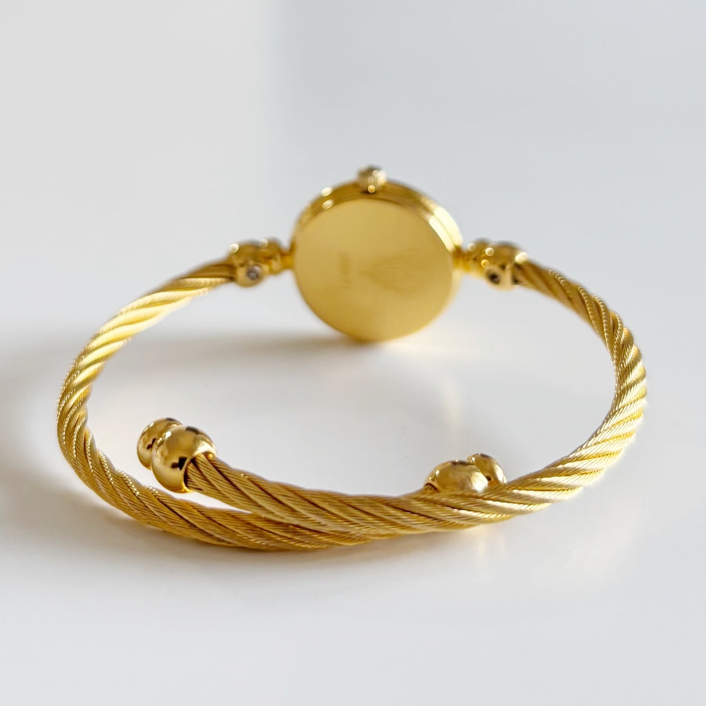 Gucci 1990s Seashell Dial Gold Plated Cable Bangle Watch